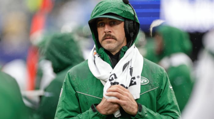New York Jets quarterback Aaron Rodgers (8) works the sidelines during the first half of an NFL football game against the New York Giants, Sunday, Oct. 29, 2023, in East Rutherford, N.J. (AP Photo/Adam Hunger)